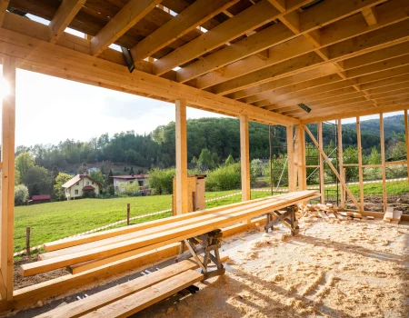 wood-framework-construction-in-a-rural-landscape-2026-03-10-22-23-30-utc-scaled.webp